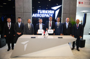 As part of IDEF 2025, the "Cube Hangar Pro Signing Ceremony" was held at the TAI booth, with participation from Teknopark Istanbul General Manager Prof. Dr. Abdurrahman Akyol and TAI General Manager Dr. Mehmet Demiroğlu. img-3